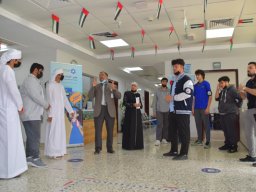 GR-12-Boys giving donation at Sharjah City for HumanitarianServices
